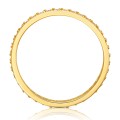 Złoty pierścionek z obrączka kamieniami