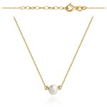 Necklace with a gold pearl and two diamond-cut balls