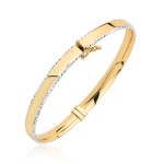 Bransoletka złota sztywna z diamentowaniem w białym złocie