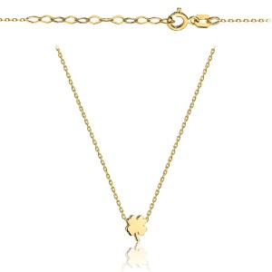 Gold necklace with a small clover