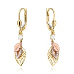 Gold leaf earrings decorated with zircons in three colors of gold
