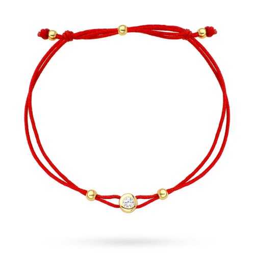 Bransoletka złote kółko z centralnym kamykiem na czerwonym sznurku