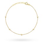 Gold ball bracelet with diamond balls on the leg