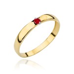 Classic gold ring with a ruby-colored stone