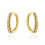 Gold ball earrings on creole