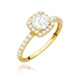 Pierścionek złoty z centralną cyrkonią w kwadracie wysadzany cyrkoniami