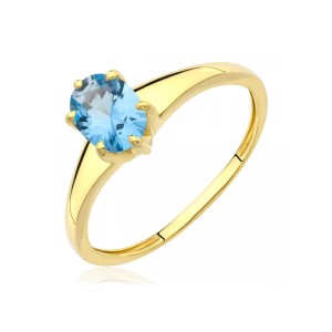 Złoty pierścionek błękitny kamień owalny pr. 333