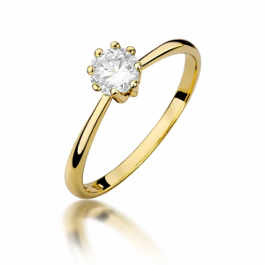 Pierścionek złoty centralna cyrkonia na cienkiej szynie