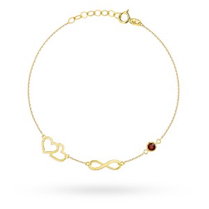 Gold bracelet with hearts, an infinity symbol, and a ruby-colored stone